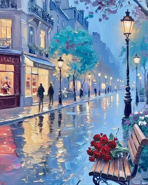 Evening street scene with people walking, illuminated by streetlights, and a bench with flowers.